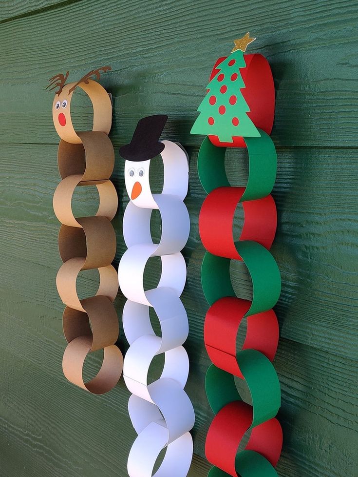 Christmas paper chains DIY featuring reindeer, snowman, and tree designs