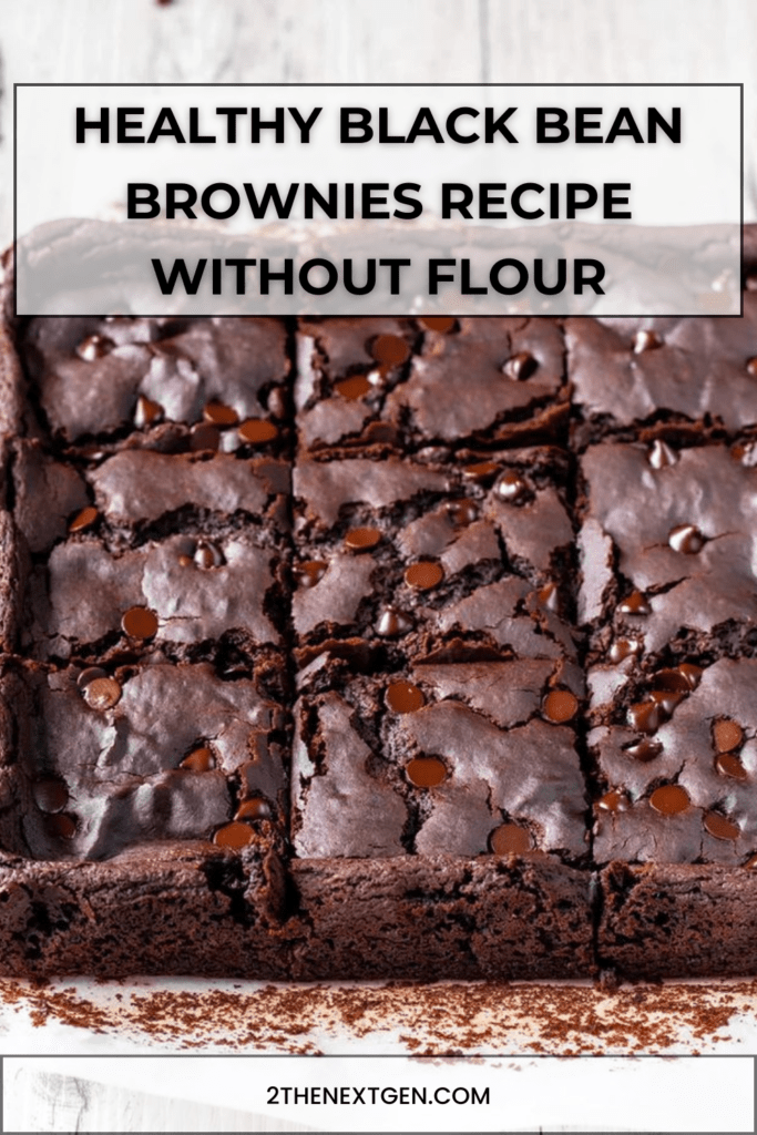 Fudgy black bean brownies cut into squares, made with cocoa powder and maple syrup, served on parchment paper in a baking dish.
