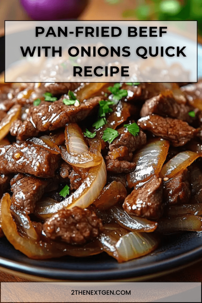 Pan-fried beef strips with caramelized onions in a skillet, coated in a glossy soy-based sauce and garnished with fresh parsley, served hot.