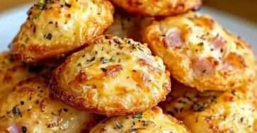 Golden savory Parmesan and Ham Cookies, freshly baked on a parchment-lined tray with a crispy texture