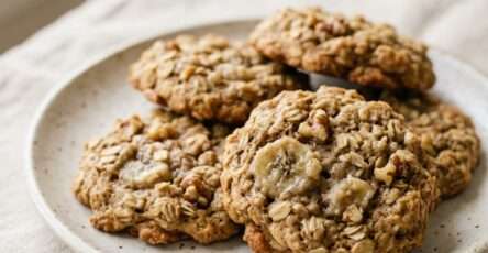 Banana oat cookies recipe served on a plate with soft texture, visible oats, and a healthy homemade look for kids snack time