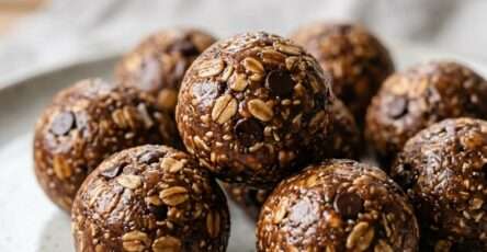 Energy balls recipe no bake with oats peanut butter and cocoa arranged on a plate with healthy snack appearance