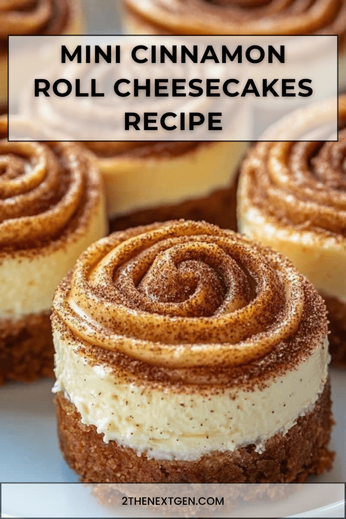 Mini cinnamon roll cheesecakes with a cinnamon swirl, buttery biscuit crust, creamy cheesecake filling, and caramel drizzle on top.