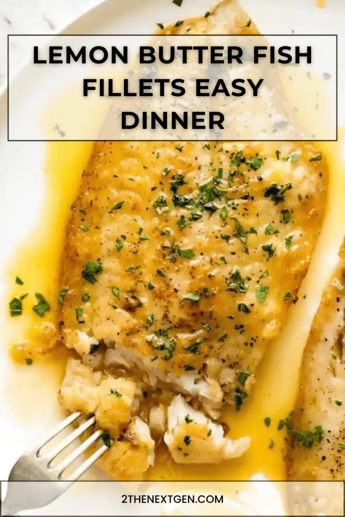 Lemon butter fish fillets served with glossy garlic lemon butter sauce, fresh parsley, lemon wedges, and a side of vegetables.