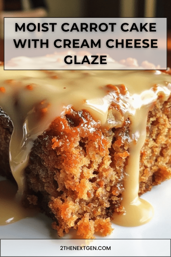Moist carrot cake topped with cream cheese glaze, chopped nuts, grated carrots, and a soft spiced crumb served on a plate.