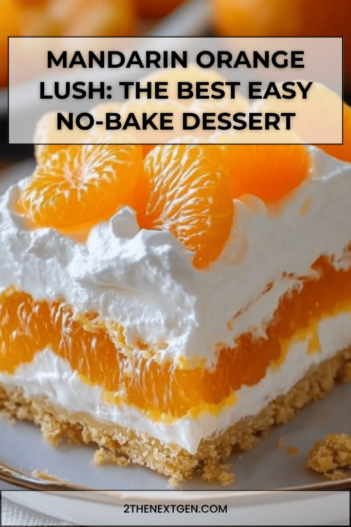 A rectangular glass baking dish displaying a layered dessert with a golden graham cracker crust, a thick white cream layer, and bright orange mandarin slices arranged on top.