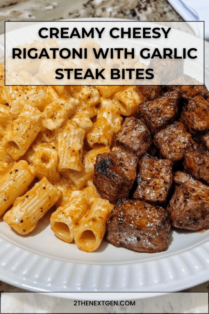 Creamy cheesy rigatoni pasta served with tender garlic butter steak bites, parmesan, parsley, and a rich homemade cheese sauce.