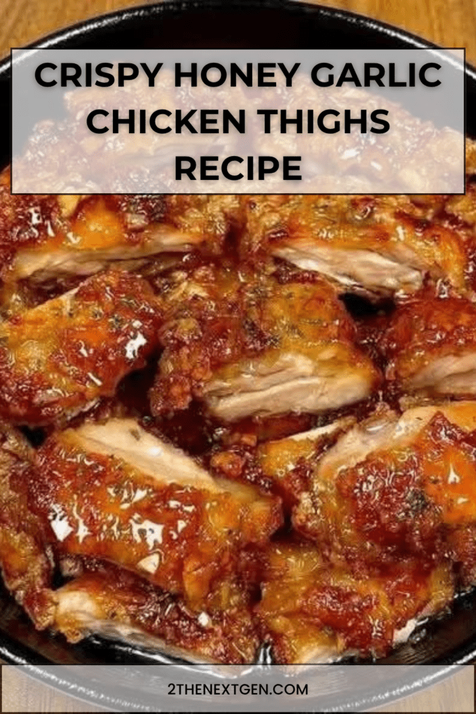 Crispy honey garlic chicken thighs sliced and served with sticky glaze, sesame seeds, green onions, and extra sauce on top.