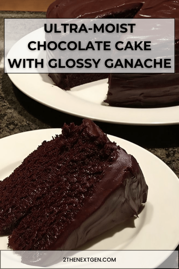 Ultra-moist chocolate cake covered with glossy chocolate ganache, sliced on a plate with a soft rich crumb and shiny topping.