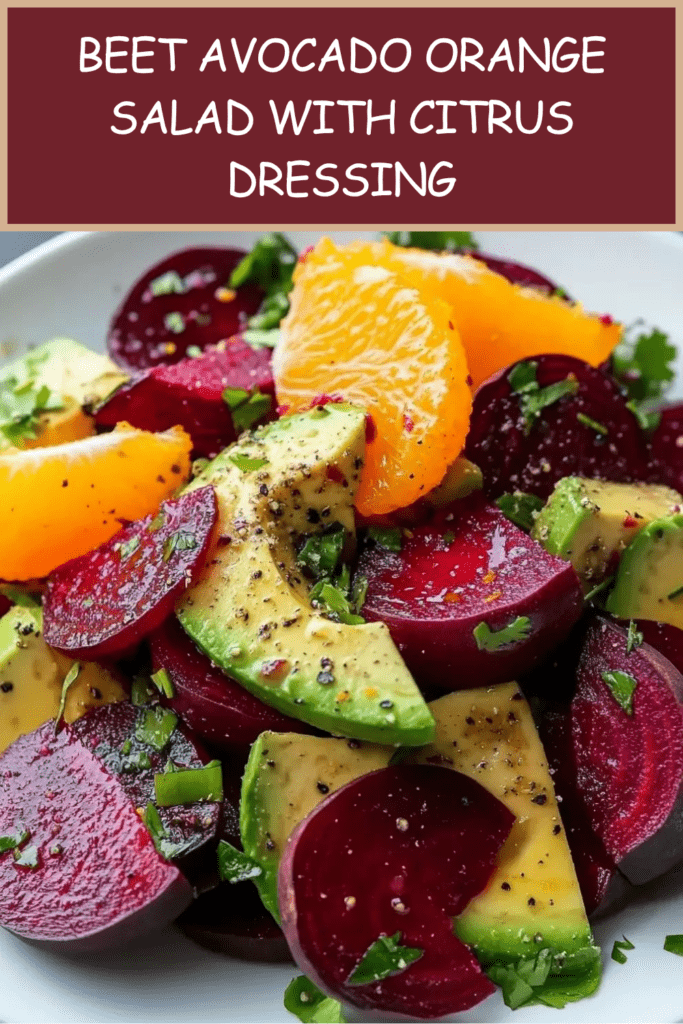 Colorful beet avocado orange salad served with sliced cooked beets, creamy avocado wedges, juicy orange segments, fresh herbs, and citrus dressing.