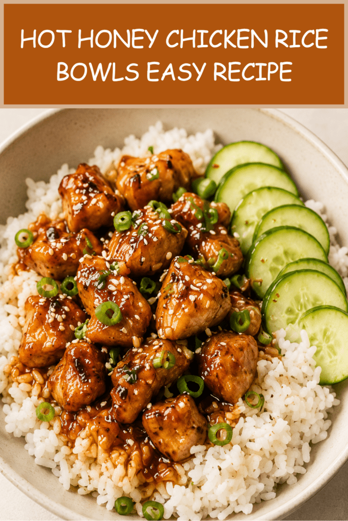 Close-up of hot honey chicken rice bowls with sticky glazed chicken pieces over fluffy white rice, sliced cucumbers, fresh herbs, sesame seeds, and spicy honey sauce.