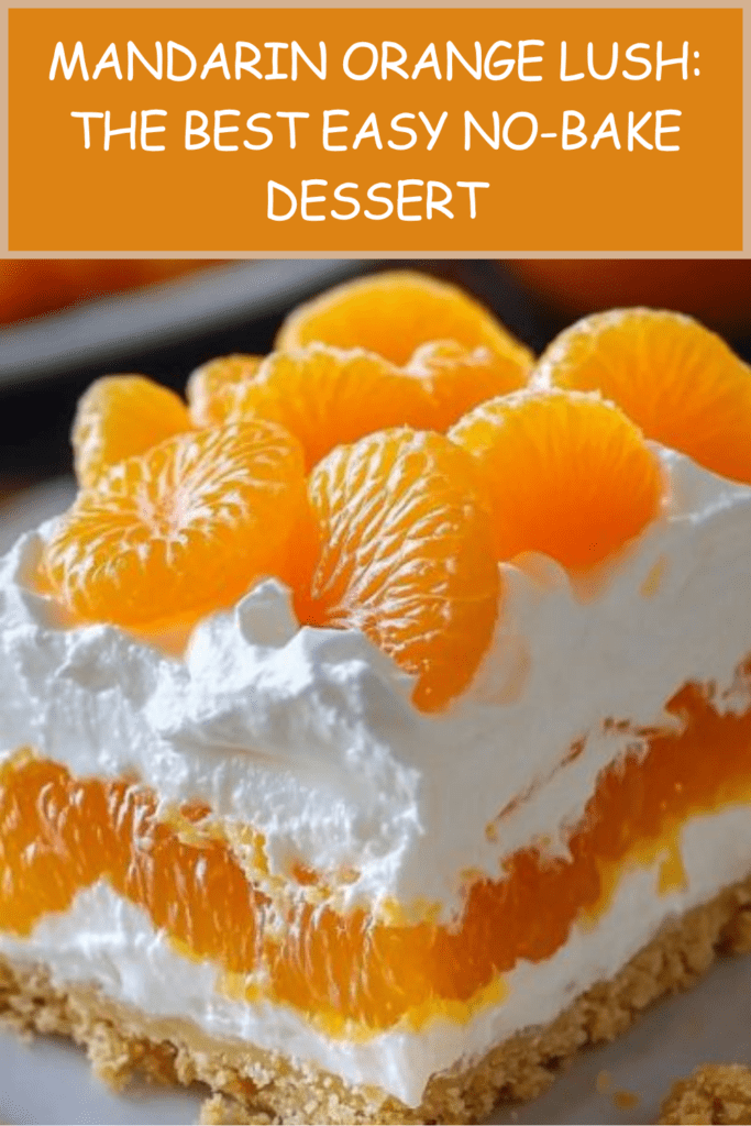 A rectangular glass baking dish displaying a layered dessert with a golden graham cracker crust, a thick white cream layer, and bright orange mandarin slices arranged on top.
