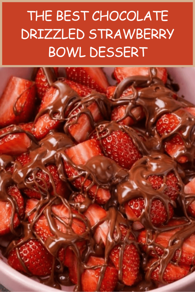 A white ceramic bowl filled with fresh red strawberry halves heavily drizzled with shiny melted dark chocolate against a clean white background.