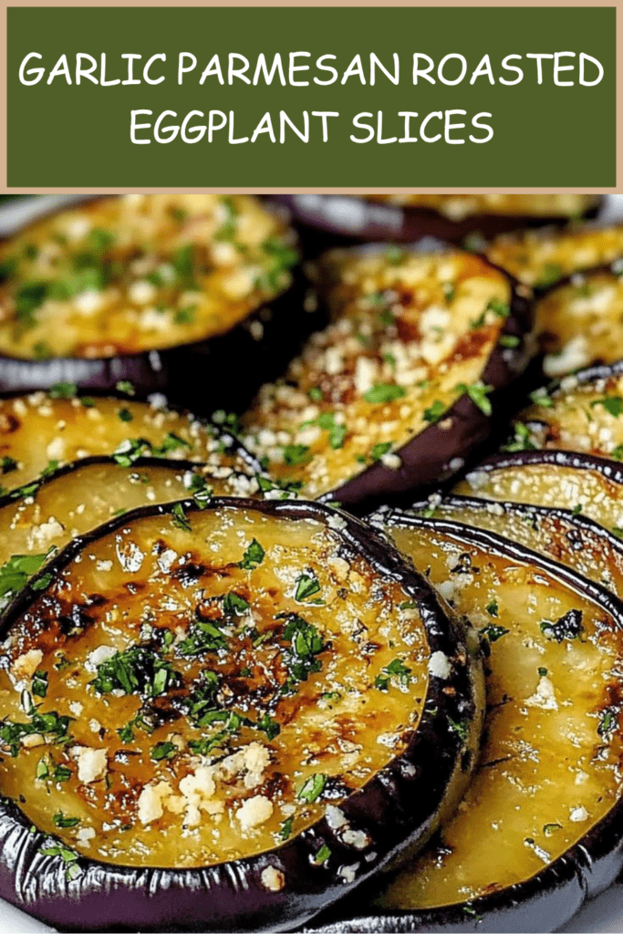 Garlic parmesan roasted eggplant slices served warm with melted parmesan, fresh parsley, golden edges, and a light lemon finish.