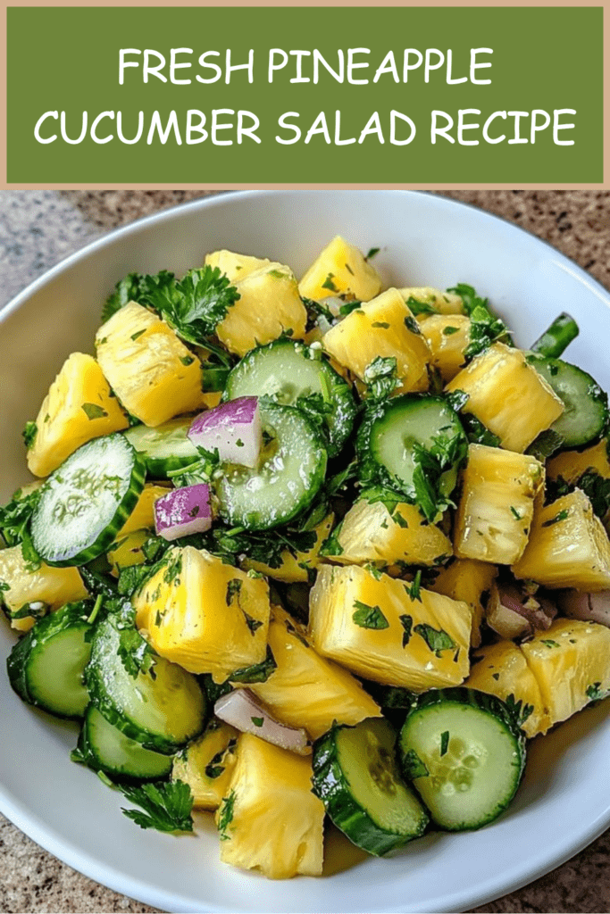 Fresh pineapple cucumber salad with juicy pineapple cubes, cucumber slices, red onion, herbs, lime dressing, and chili flakes in a bowl.