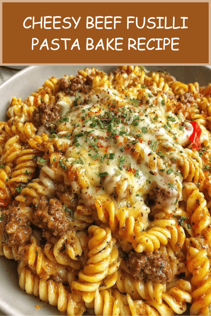 Cheesy beef fusilli pasta bake served hot with melted mozzarella, cheddar, parmesan, rich beef tomato sauce, and fresh parsley.