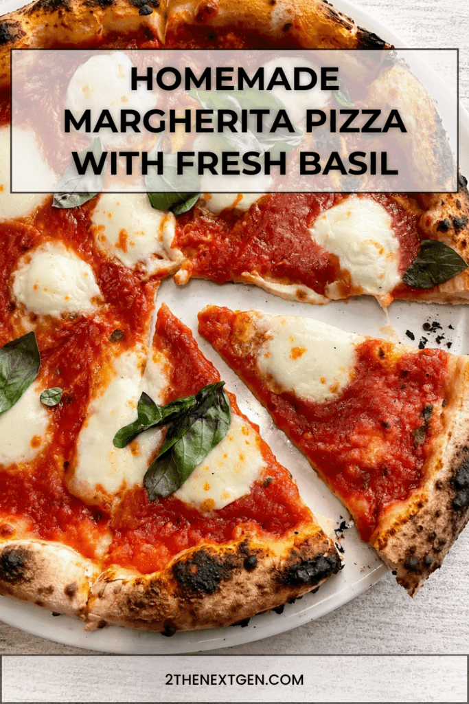 Homemade Margherita pizza with golden airy crust, red tomato sauce, melted fresh mozzarella, basil leaves and a drizzle of olive oil.